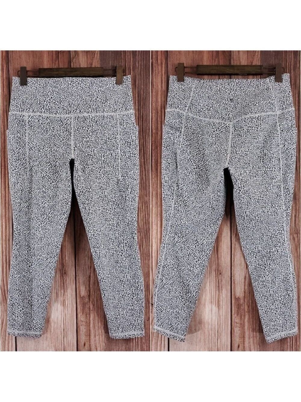 Athleta Womens Large Salutation Stash II Textured Tight Micro Cheetah 631936